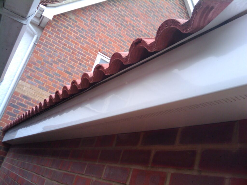 Tiles over the felt, over the fascia board