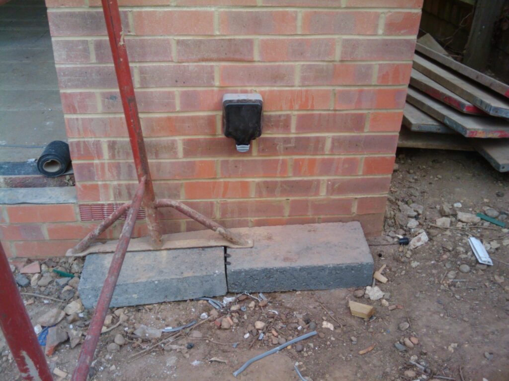 Outside electric socket - comes with remove control. Maybe I could set up a device to scare cats ....
