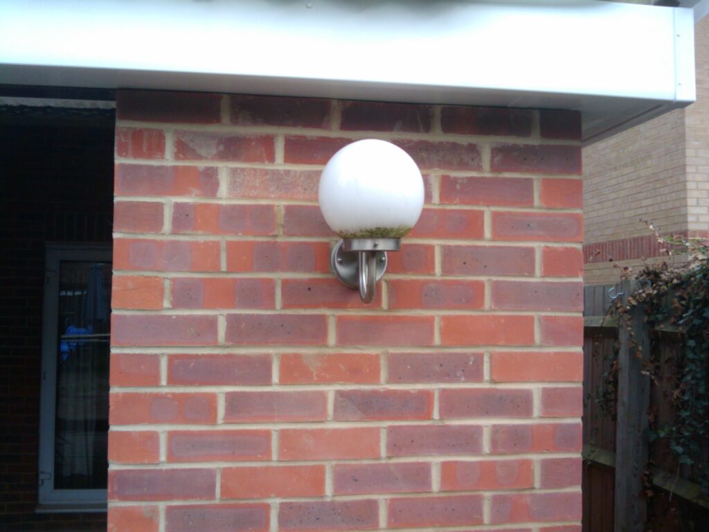 Old outside light moved. We have decided to get another light socket for the left side of the wall.
