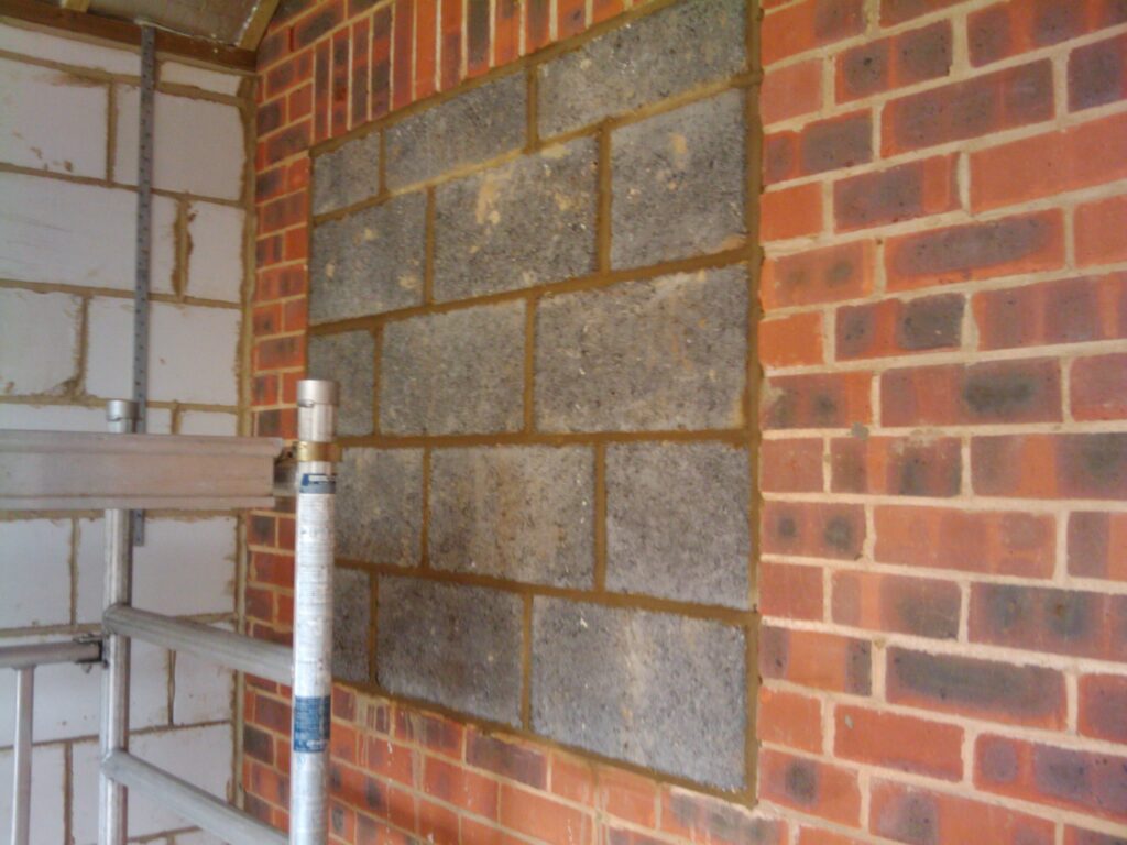 The old kitchen window is bricked up