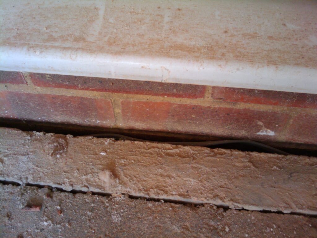 Electric cables down this gap, soon to be covered in slurry, insulation and screed