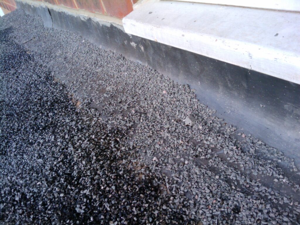 Roof flashing against the house