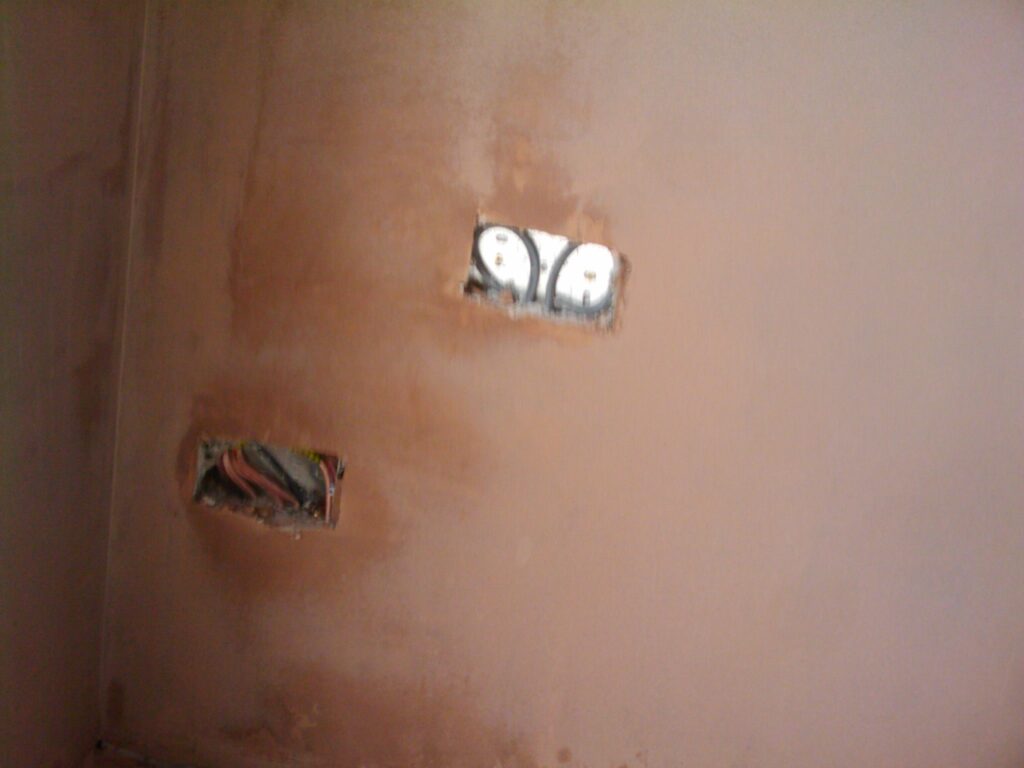 Plaster around the plug sockets