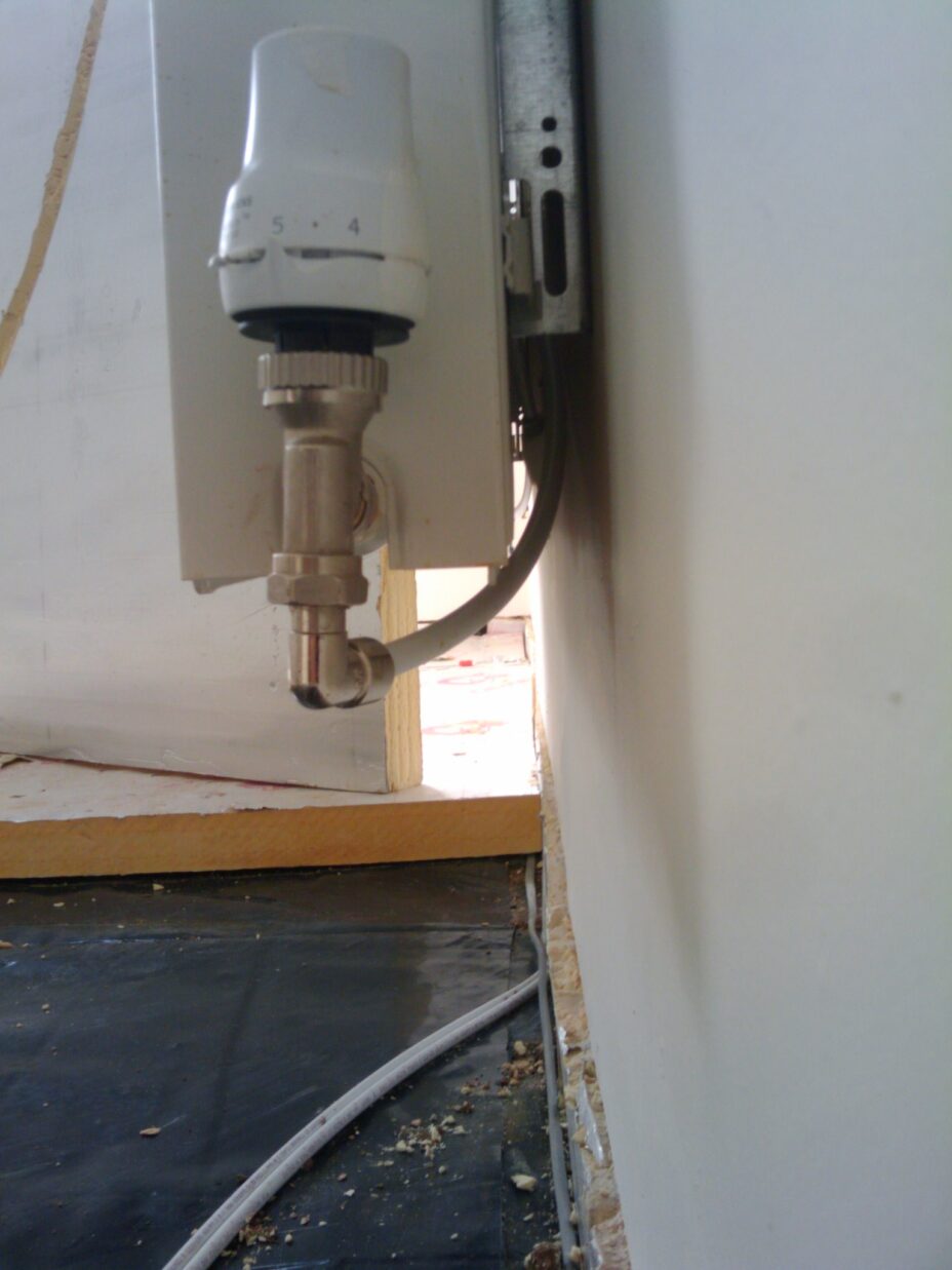 pipes behind radiator