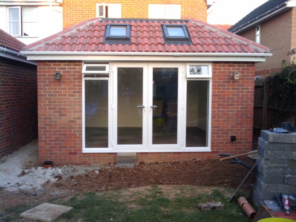French doors and patio - the table and chairs will be to the right of the photo