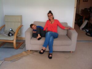 First sit on the sofa