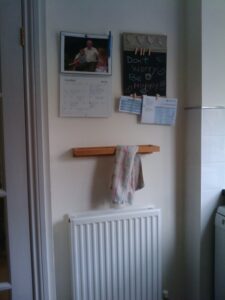 Tea towel holder next to sink