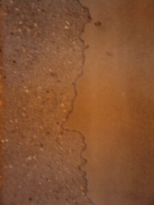 Latex tide mark with new screed - need to wait another 6 weeks before we can cover that up