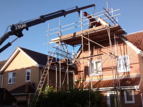 steel craned into roof