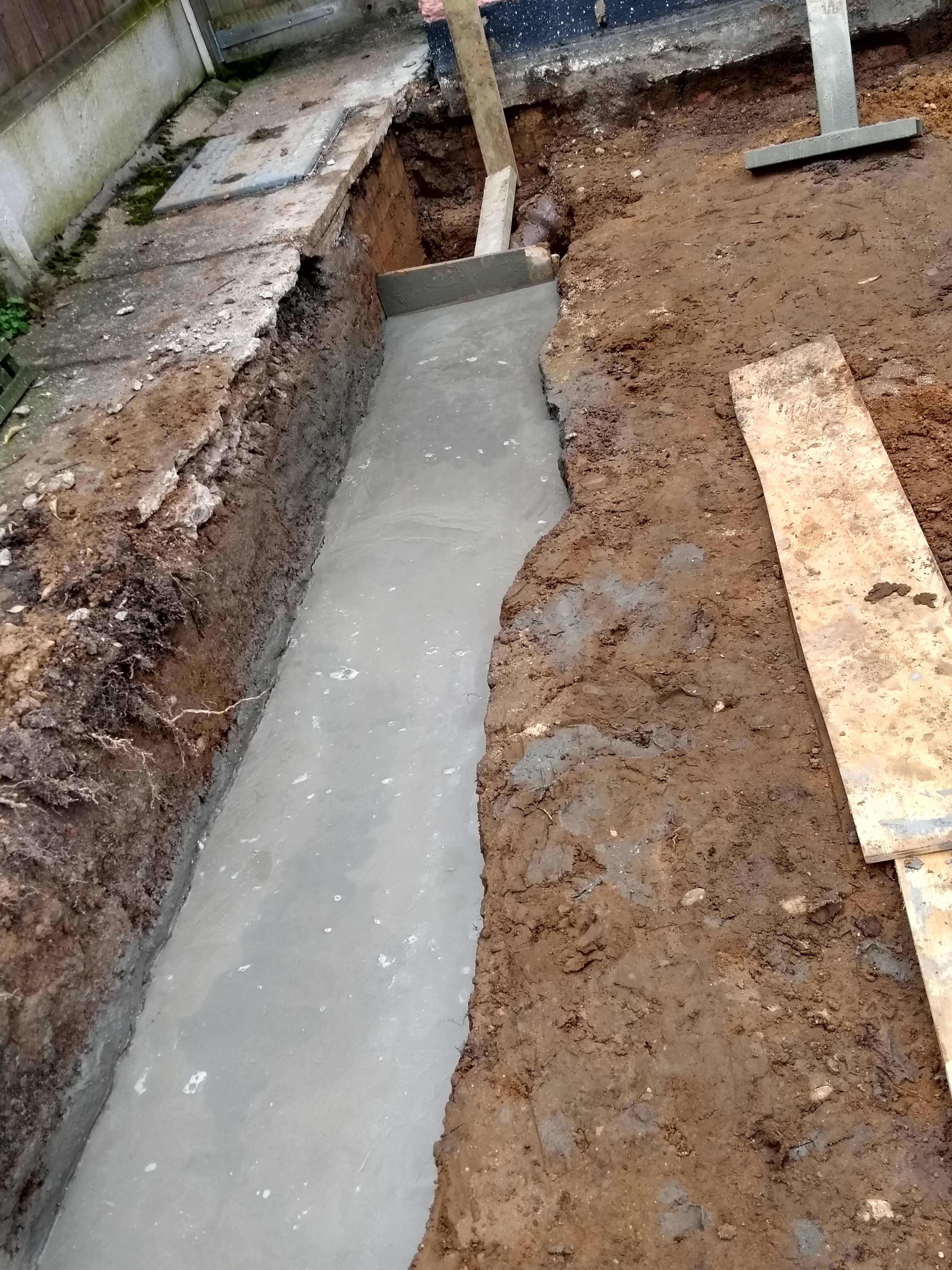 smooth concrete in foundation trench